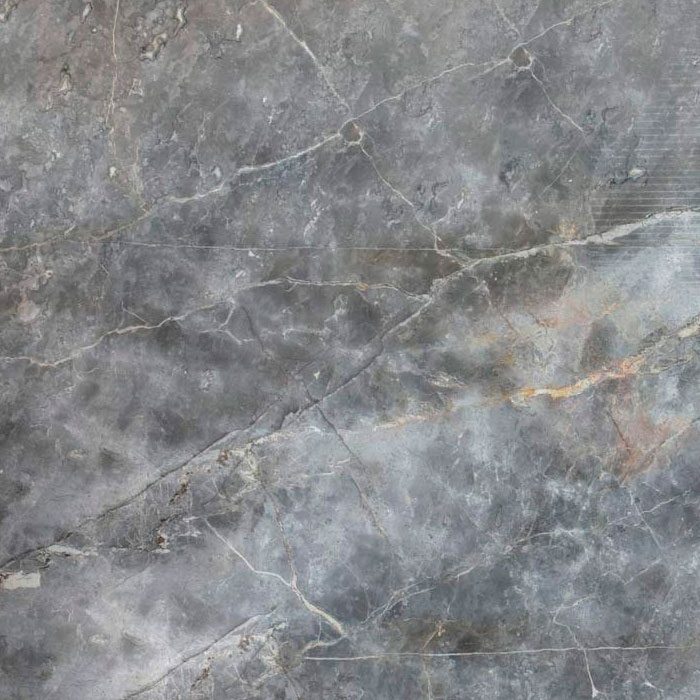 Superficie de mármol gris con vetas doradas y blancas.